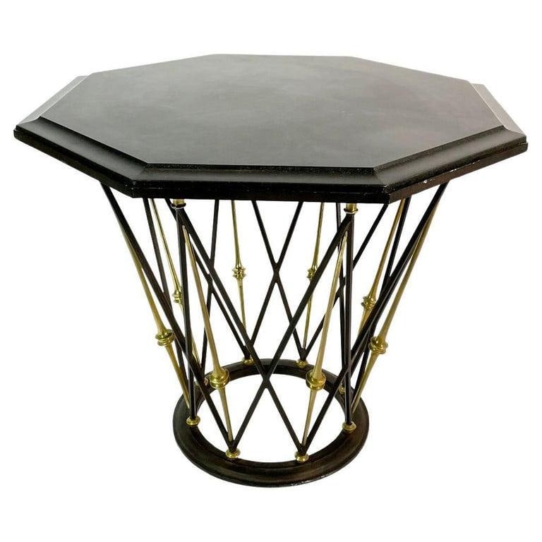 French Center Table in Brass & Wrought Iron with Octagonal Slate Top: Stunningly beautiful center table made in France. The table's base is made in a combination of wrought iron and solid brass lattice giving it a very unique look. The top has an octagonal shape encas