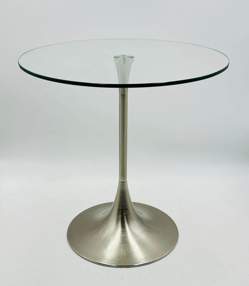 'Bugle' Base Side Table in the Style of Charles Hollis Jones: "Bugle" Base Side Table in the Style of Charles Hollis Jones.Nickel base and glass top. Measurements: 19.75 inches in diameter x 19.50 inches high. All items are sold as is. The auction house does n