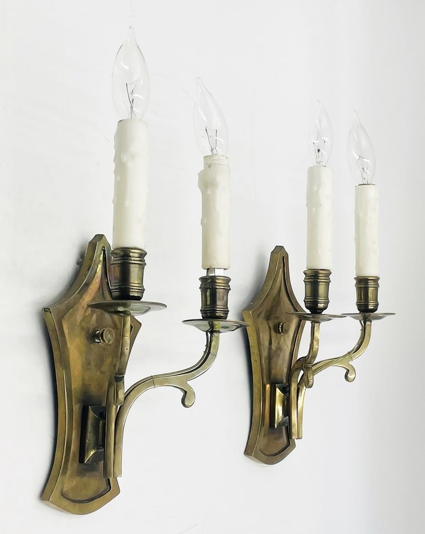 Pair of Bronze Wall Sconces With two Arms Each, Attb to Vaughan Designs: Pair of of Vintage trio of bronze 2 Arm Candelabra Wall Sconces attributed to Vaughan Designs.The sconces are well-made, each sconce holds two candles and are ready to grace your walls.Measurements:12