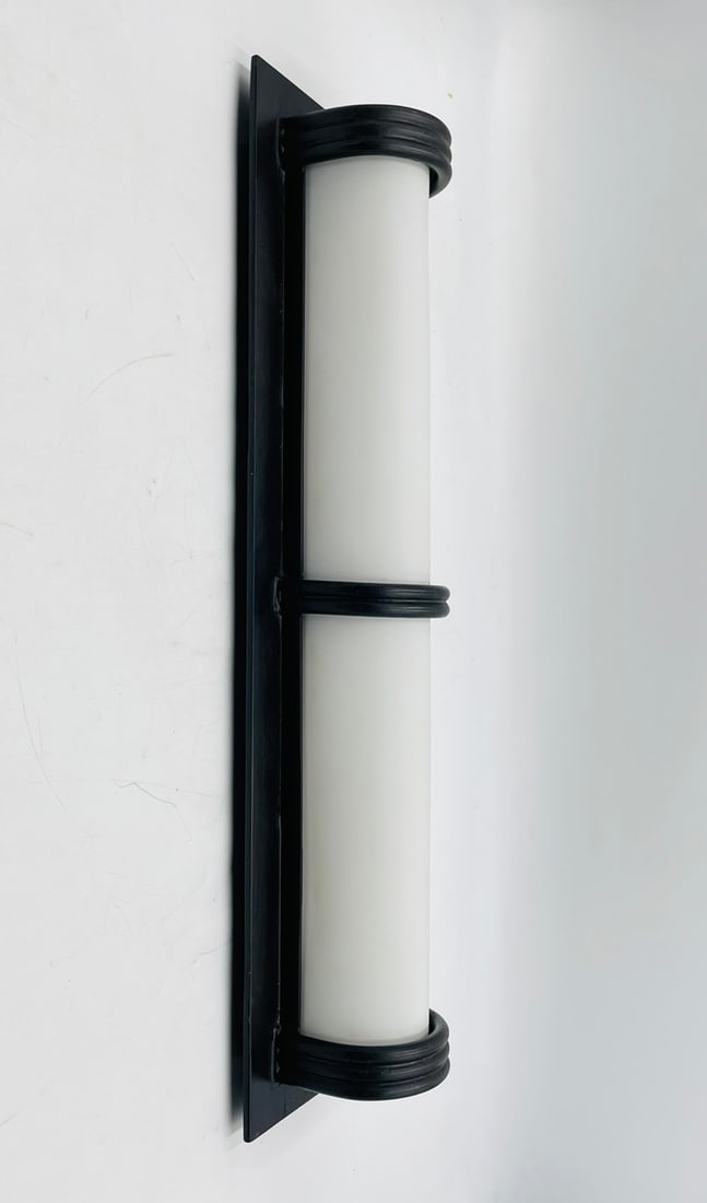 Modern Wall Sconce With Lucite Shade by Steven Handelman Studios, USA 2000's: Modern wall sconce designed and manufactured in the United States by Steven Handelman Studios in the early 2000's. The piece retains the Steven Handelman "H" hallmark. Measurements: 24 inches high