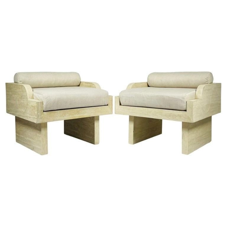 Pair of Travertine Arm Chairs Attb to Stephane Parmentier: Stunning pair of armchairs designed and manufactured in France.Made in solid travertine, beautiful architectural lines and upholstered in an off white fabric.The chairs are attributed to Stephane Parm