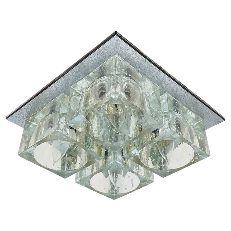 Flush Mount Chrome & Murano Glass Ceiling Light by Sciolari for Lightolier: This brilliant Mid-Century Modern flush mount chandelier was realized by the esteemed Italian glass blower Gaetano Sciolari for Lightolier, circa 1970. It features four thick translucent Murano glass