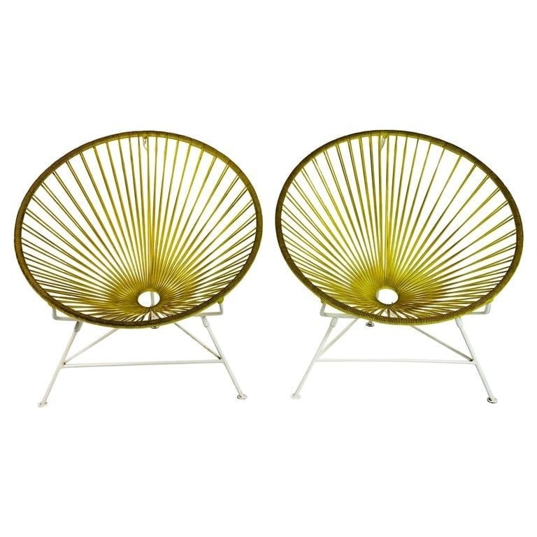 Acapulco Patio Chairs by Innit Designs.: The Innit Designs Acapulco Chair is cool in more ways than one. Based on the original 1950s design, it has an open and airy yet ergonomic and supportive open weave vinyl seat inspired by traditional M