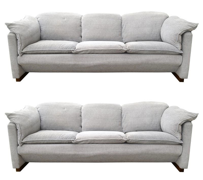 Pair of Vintage Sofas by Niels Eilersen: Country: Denmark Period: 1970's Description: Pair of vintage sofas by the design firm Eilersen. The design firm is based in Denmark and is the 4th generation of furniture makers and these sofas show t