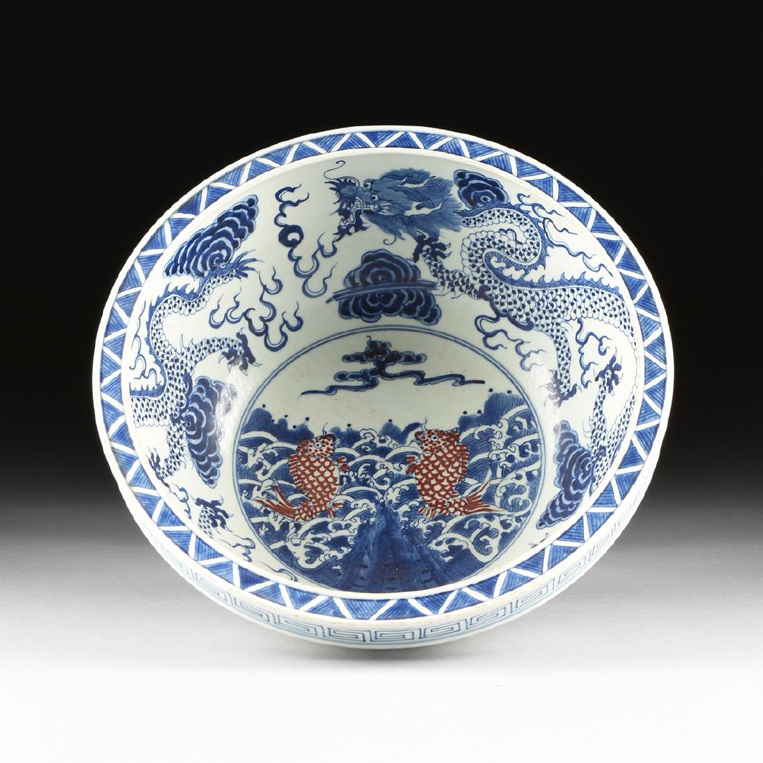 A CHINESE KANGXI STYLE IRON RED, BLUE, AND WHITE GLAZED (1 of 7)