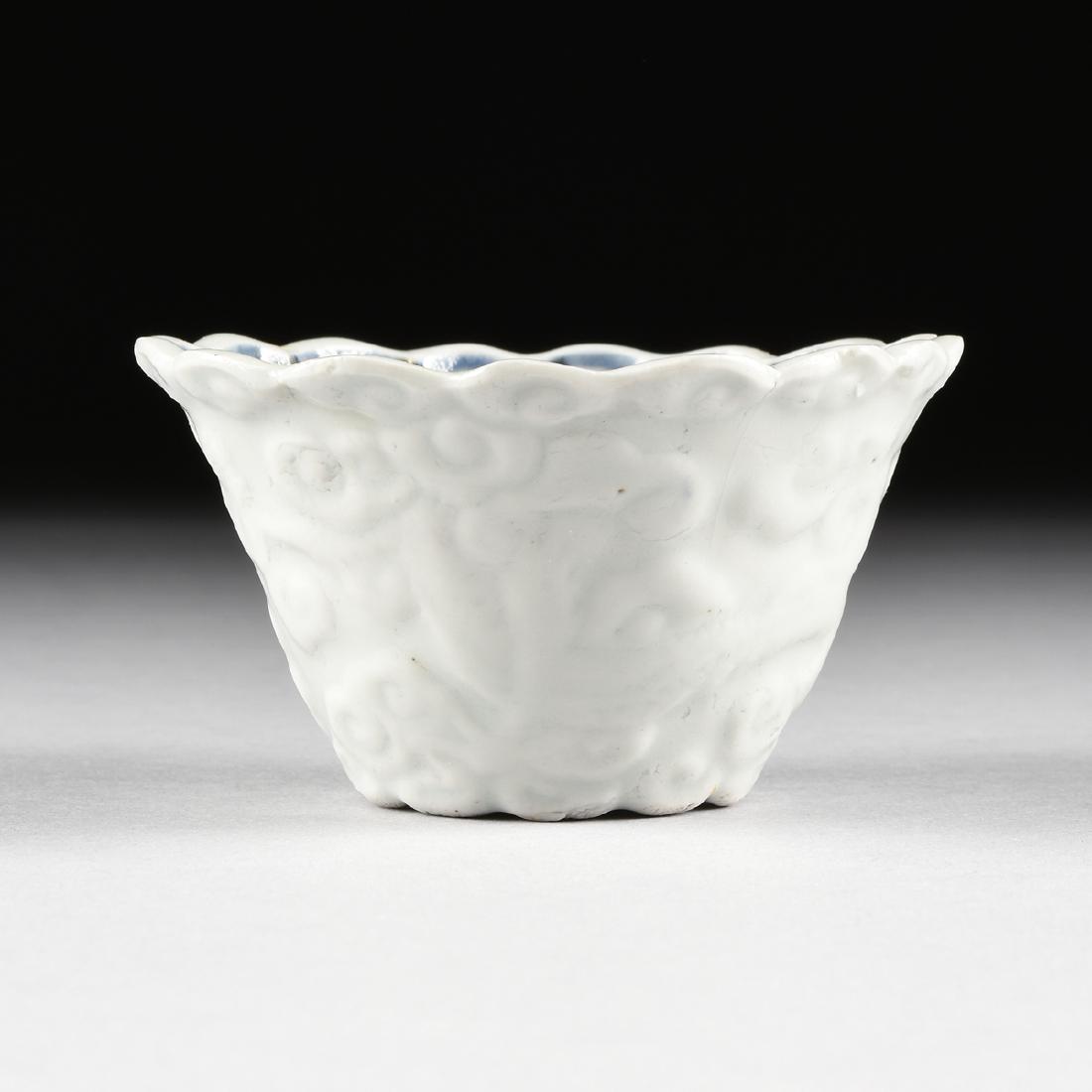 A CHINESE SONG DYNASTY STYLE LOBED RELIEF DRAGON BLUE (1 of 5)