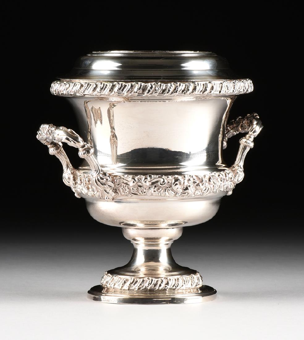 A SHEFFIELD SILVER PLATED WINE COOLER WITH INSERT,: A SHEFFIELD SILVER PLATED WINE COOLER WITH INSERT, ENGLAND, LATE 19TH CENTURY, of baluster form with twist gadrooned rim and base and repoussé foliate band at the waist, reeded "D" shape handles with