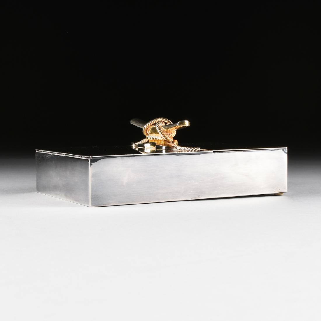 A GUCCI SILVER AND GILT PLATED DOUBLE TABLE TOP (1 of 5)