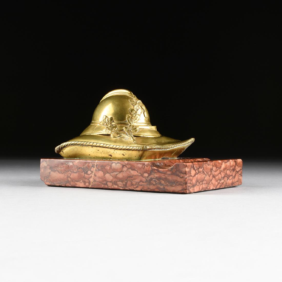 A CONTINENTAL POLISHED CAST BRASS FIRE HELMET FORM (1 of 12)