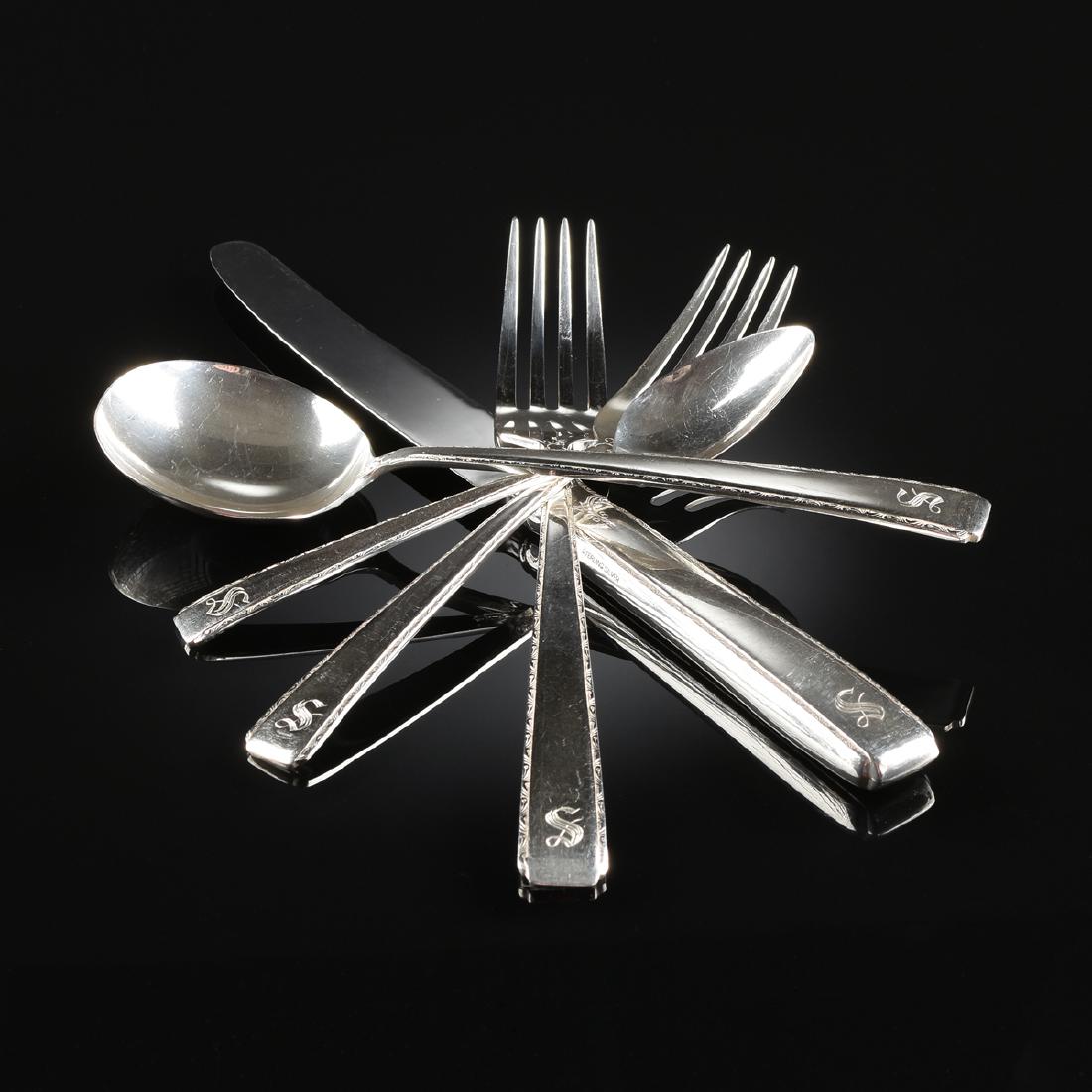 A ONE HUNDRED TWENTY-NINE PIECE AMERICAN STERLING (1 of 3)