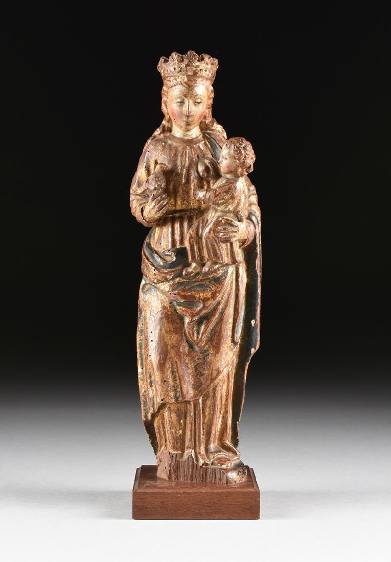 A PARCEL GILT POLYCHROME CARVED LIME WOOD SANTO FIGURE (1 of 8)
