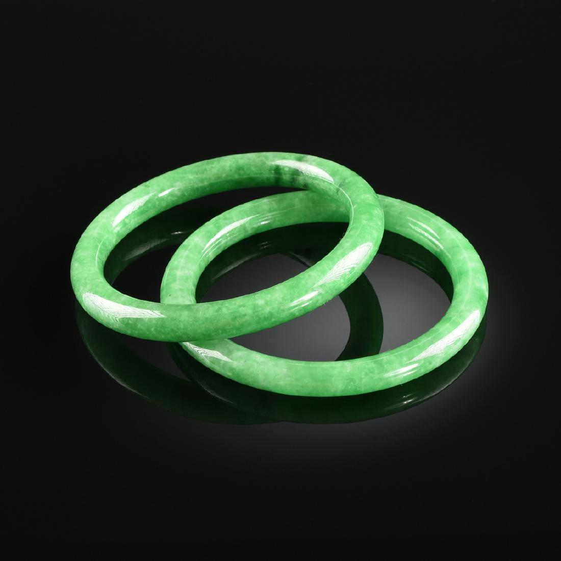 A PAIR OF CHINESE APPLE GREEN JADEITE BANGLE BRACELETS, (1 of 1)
