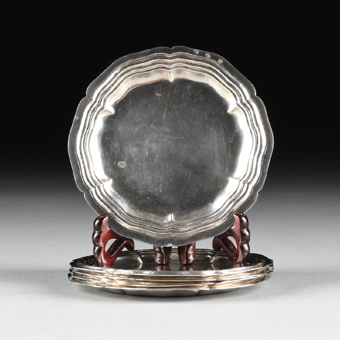 A GROUP OF FIVE SOUTH AMERICAN SILVER COASTERS,: A GROUP OF FIVE SOUTH AMERICAN SILVER COASTERS, POSSIBLY CHILE, 20TH CENTURY, of shaped circular form with repoussé triple wave border, unidentified marks, total approximate weight: 13.45 troy ounces