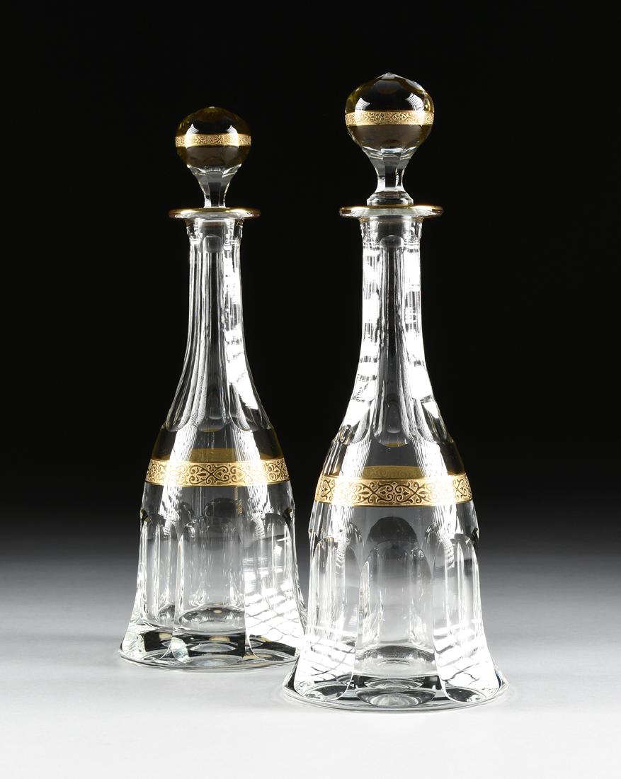 A PAIR OF MOSER CUT CRYSTAL DECANTERS WITH STOPPERS IN (1 of 8)