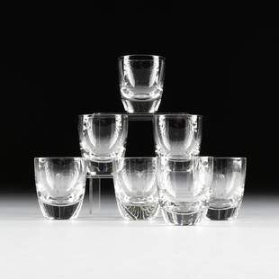 NANNY STILL (Finnish 1926-2009) A SET OF SEVEN CLEAR: NANNY STILL (Finnish 1926-2009) A SET OF SEVEN CLEAR BLOW MOLDED GLASSES IN THE "SV" PATTERN, for Riihimaen Lasi Oy, Riihimaki, Finland, designed 1950, produced circa 1950-1990, the ovoid form small g