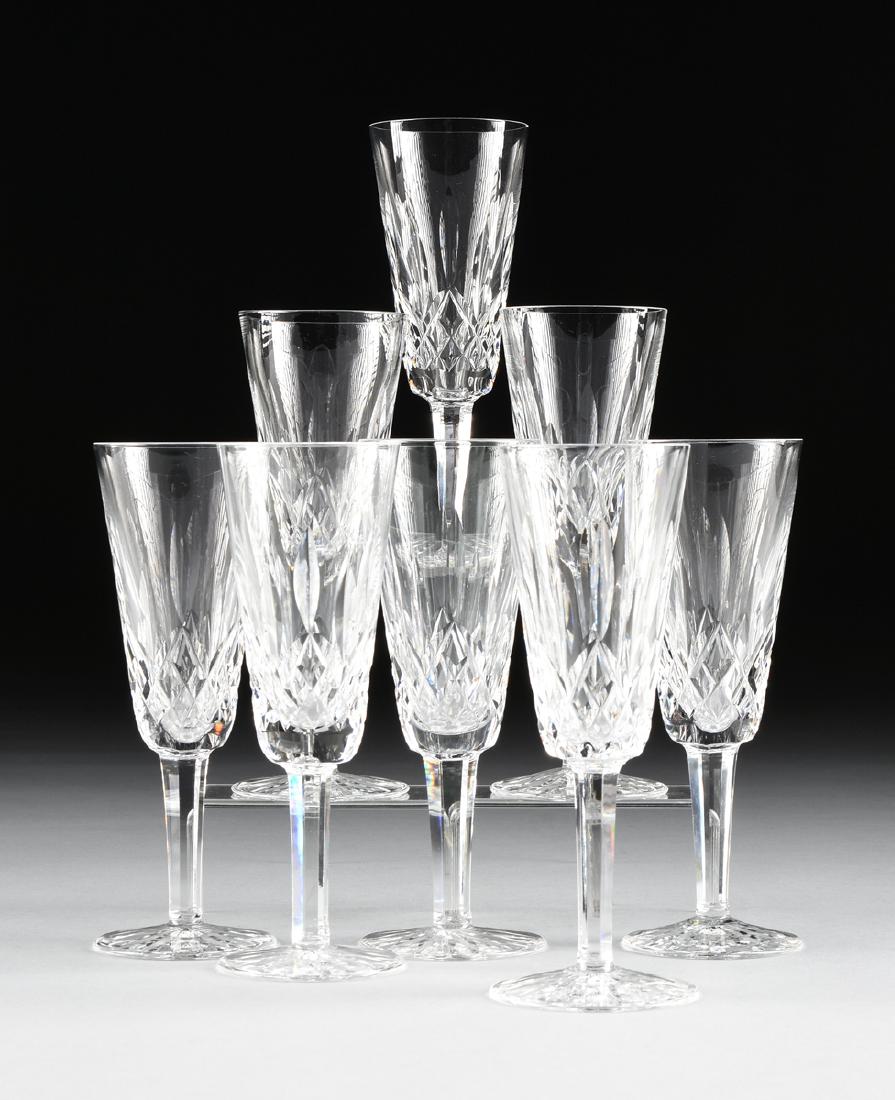 A SET OF EIGHT WATERFORD CUT CRYSTAL CHAMPAGNE FLUTES