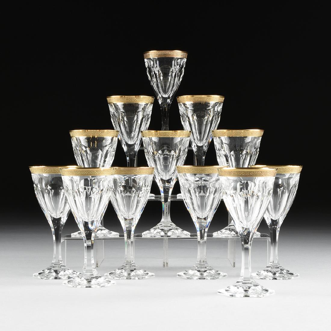 A SET OF TWELVE MOSER CUT CRYSTAL WHITE WINE GLASSES IN