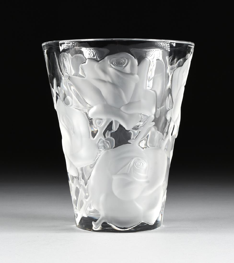 MARIE-CLAUDE LALIQUE (French 1935-2003) AN ETCHED: MARIE-CLAUDE LALIQUE (French 1935-2003) AN ETCHED PARTIALLY FROSTED MOLDED CRYSTAL VASE, "Ispahan Rose," Wingen-sur-Moder, France, 1992, flared cylindrical with etched and frosted rose decoration, eng