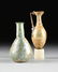 A GROUP OF TWO ANCIENT ROMAN BLOWN GLASS VESSELS, AD