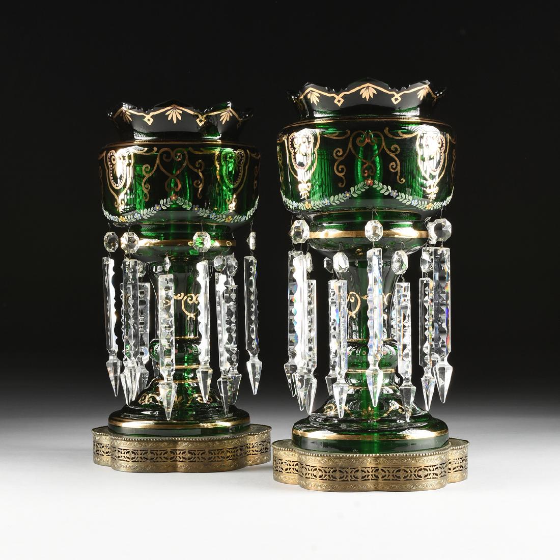 A PAIR OF BOHEMIAN GILT AND ENAMEL DECORATED GREEN: A PAIR OF BOHEMIAN GILT AND ENAMEL DECORATED GREEN GLASS MANTLE LUSTERS WITH CUT CRYSTAL PRISMS, 20TH CENTURY, the baluster form lusters with everted saw tooth rim, the exterior with gilt linear decor