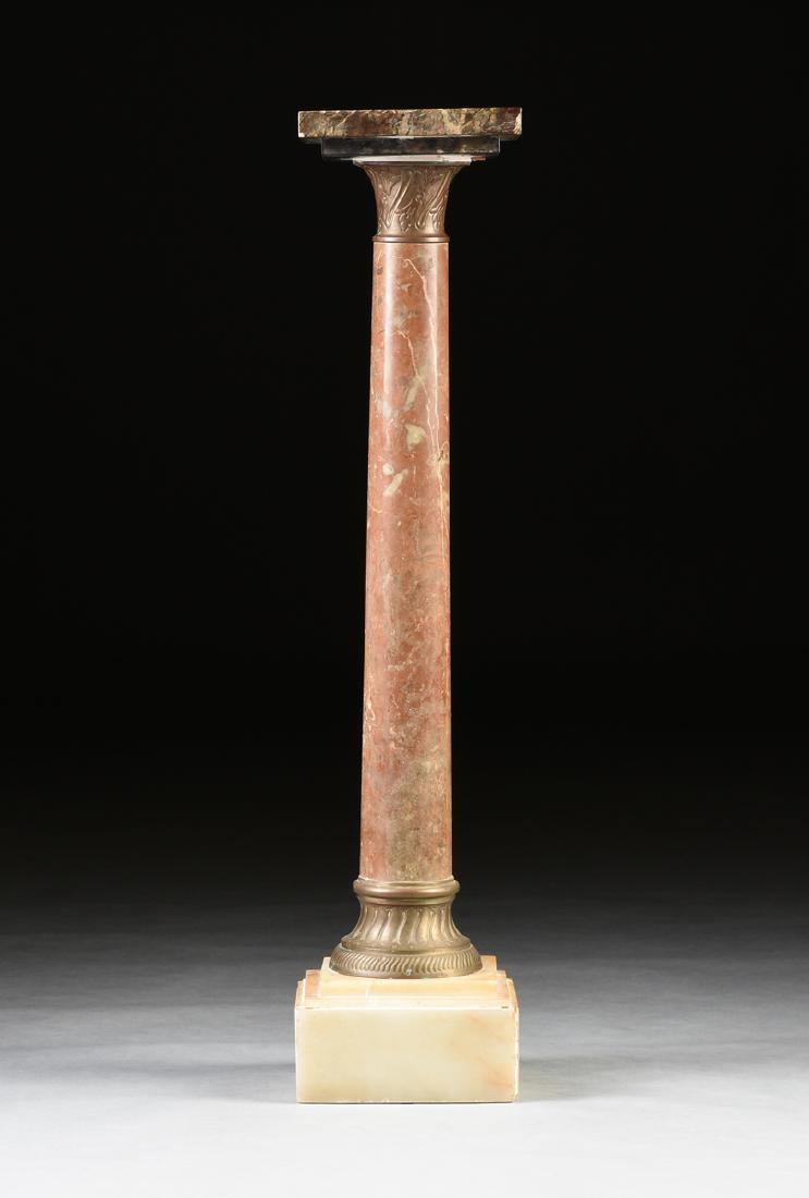 A LATE FRENCH BELLE ÉPOQUE CAMPAN GRAND MELANGE,: A LATE FRENCH BELLE ÉPOQUE CAMPAN GRAND MELANGE, BRECCIA PERNICE MARBLE AND ALABASTER BRASS MOUNTED PEDESTAL, EARLY 20TH CENTURY, the highly figured rouge and vert square top, over a stylized, twiste