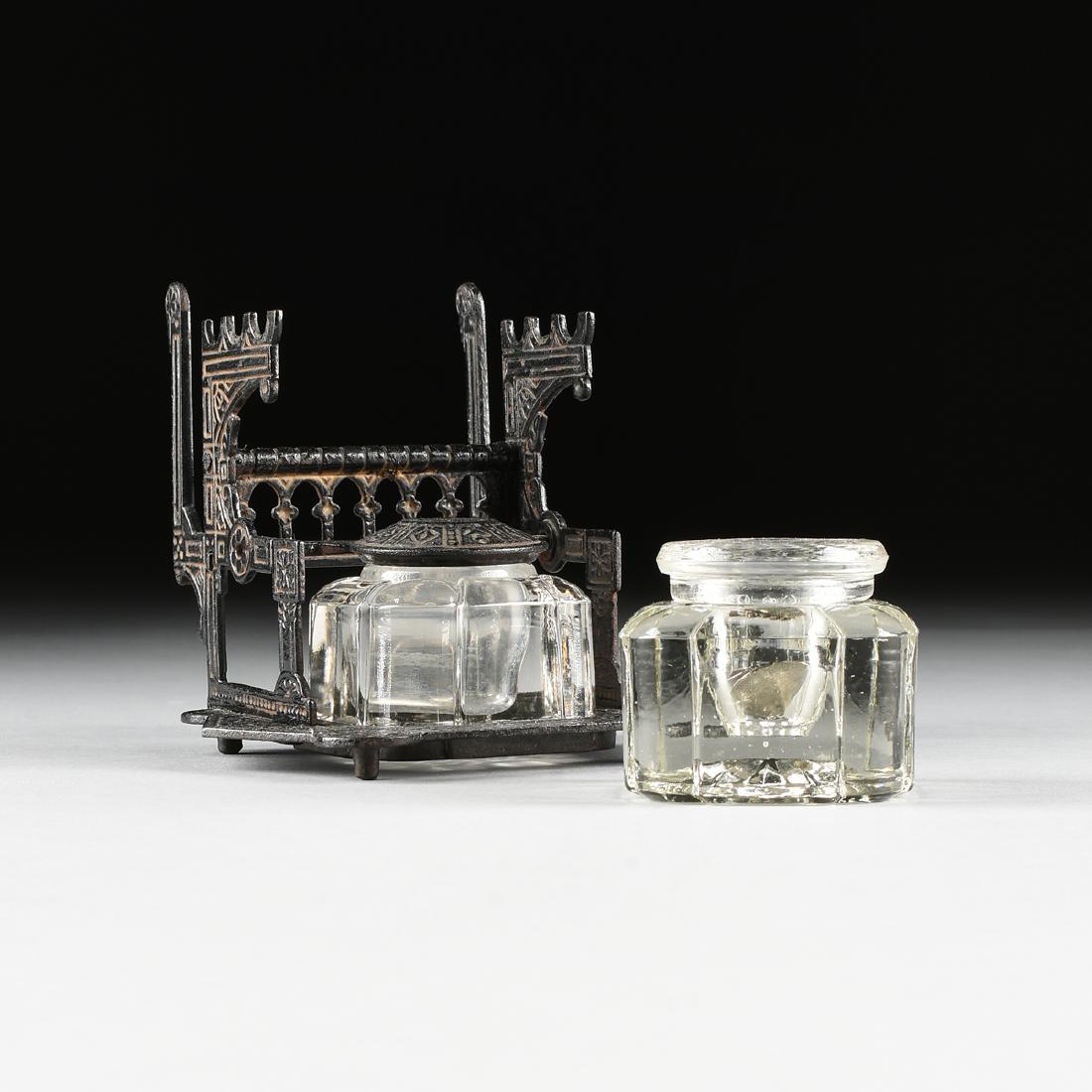 attributed to SAMUEL CANBY TATUM (American 1827-1887): attributed to SAMUEL CANBY TATUM (American 1827-1887) AN EASTLAKE STYLE GILT ENAMELED CAST IRON AND GLASS ENCRIER, PATENTED NOVEMBER 25, 1879, with envelope and pen storage. Height: 5 1/4" Width: 5 1/