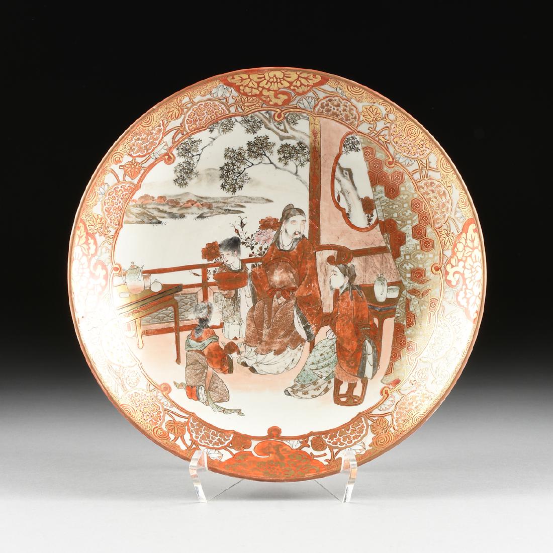 A JAPANESE KUTANI EIRAKU STYLE PARCEL GILT PAINTED: A JAPANESE KUTANI EIRAKU STYLE PARCEL GILT PAINTED PORCELAIN BOWL, POSSIBLY MEIJI PERIOD (1868-1912), the over glaze ironstone red, green, black, and gilt decoration, of an interior familial scene, on