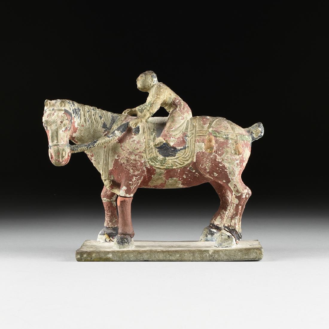 A TANG DYNASTY STYLE CARVED STONE STATUE OF A HORSE AND (1 of 10)