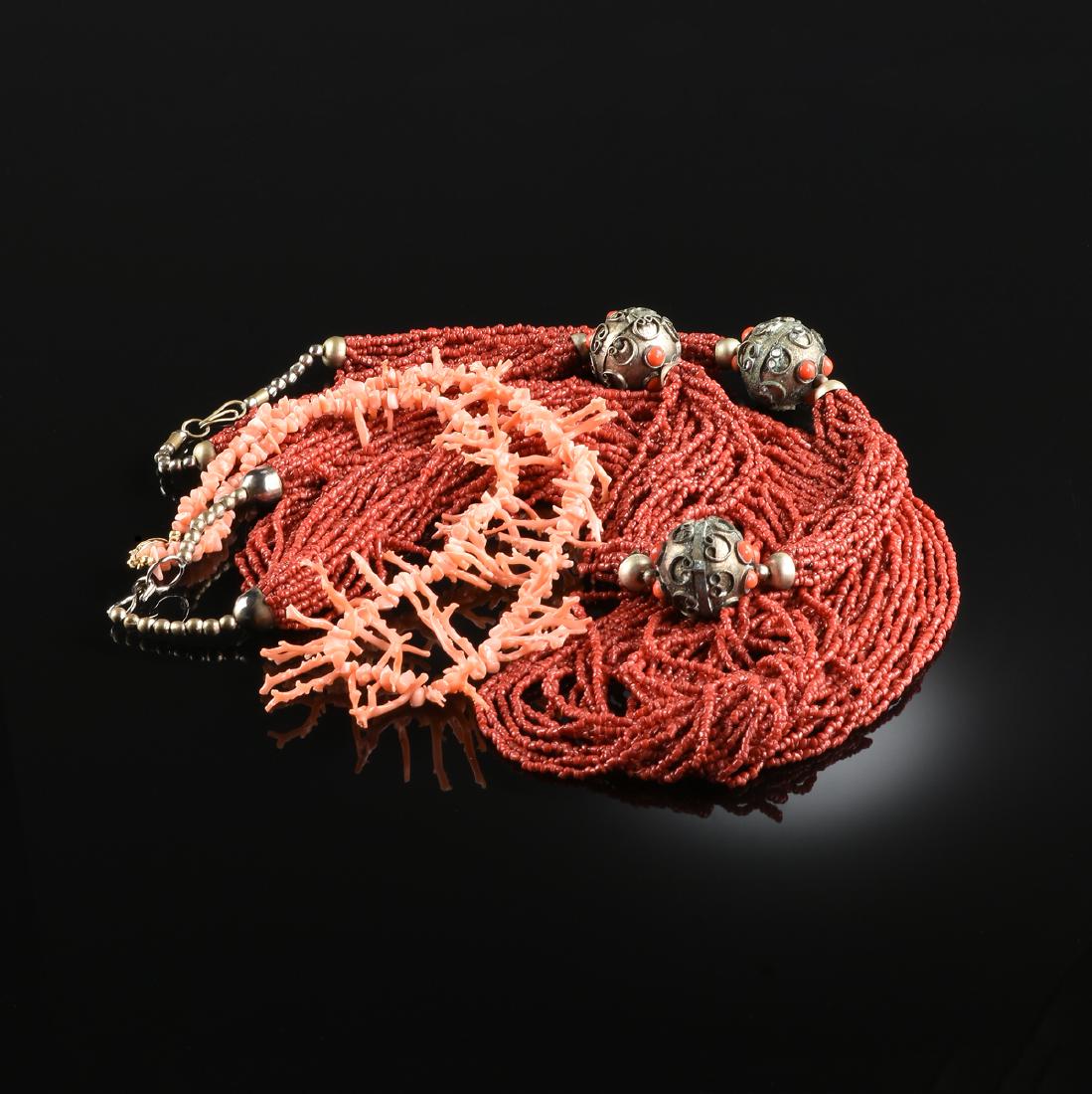 A GROUP OF THREE CORAL NECKLACES, (1 of 5)