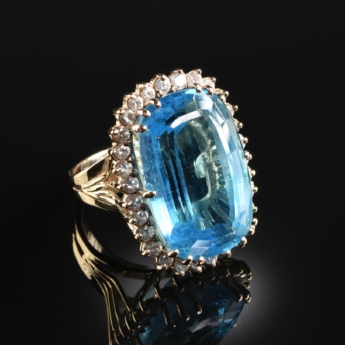 A 14K YELLOW GOLD, BLUE TOPAZ, AND DIAMOND LADY'S RING, (1 of 2)
