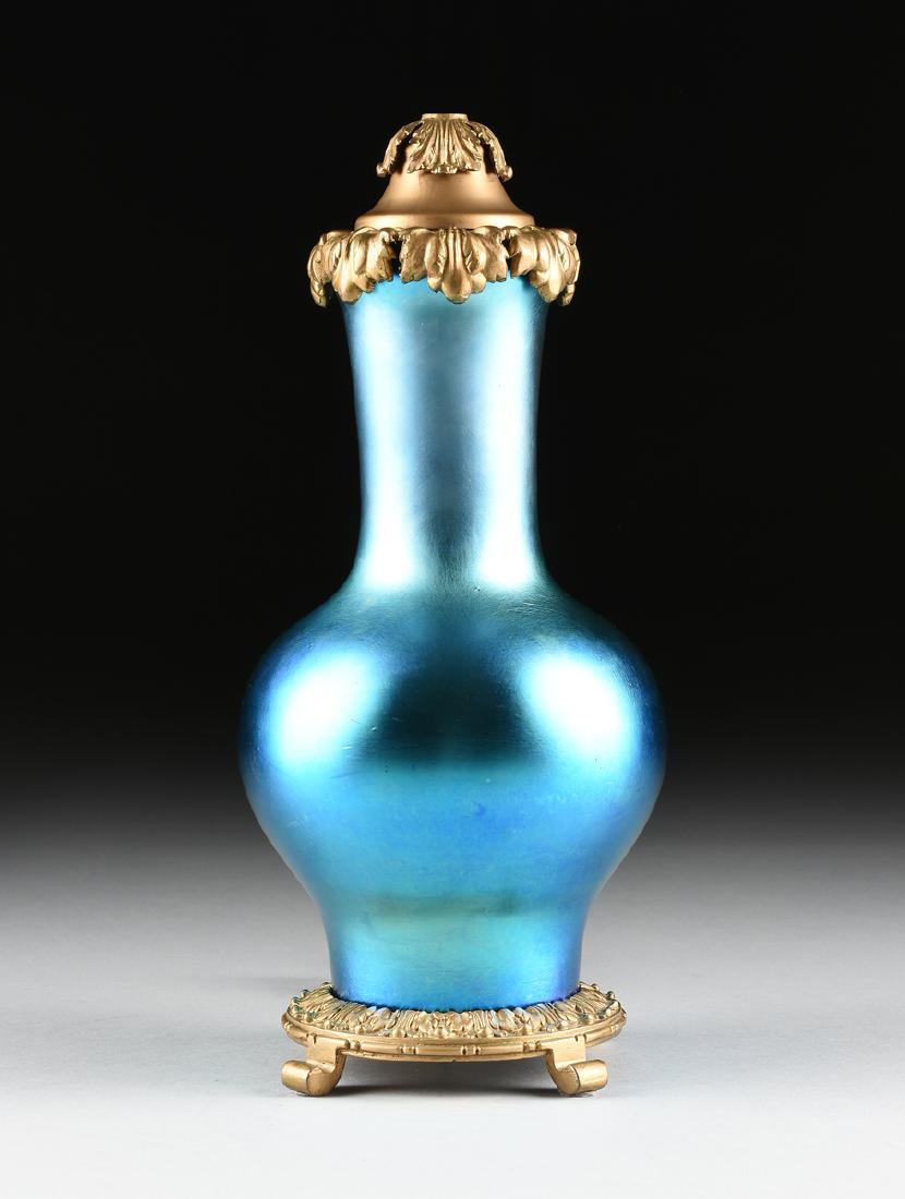 A STEUBEN BLUE AURENE IRIDESCENT GLASS VASE MOUNTED AS (1 of 5)