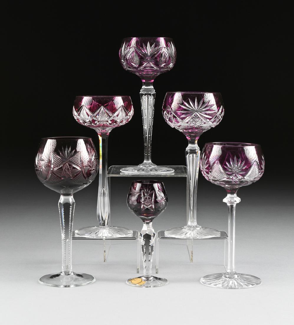 A GROUP OF SIX CONTINENTAL AMETHYST CASED WINE GLASSES: A GROUP OF SIX CONTINENTAL AMETHYST CASED WINE GLASSES CUT TO CLEAR, CIRCA 1940-1960, comprising an Imperlux cordial glass, the teardrop form bowl with etched grape leaf and fruit between shaped recta
