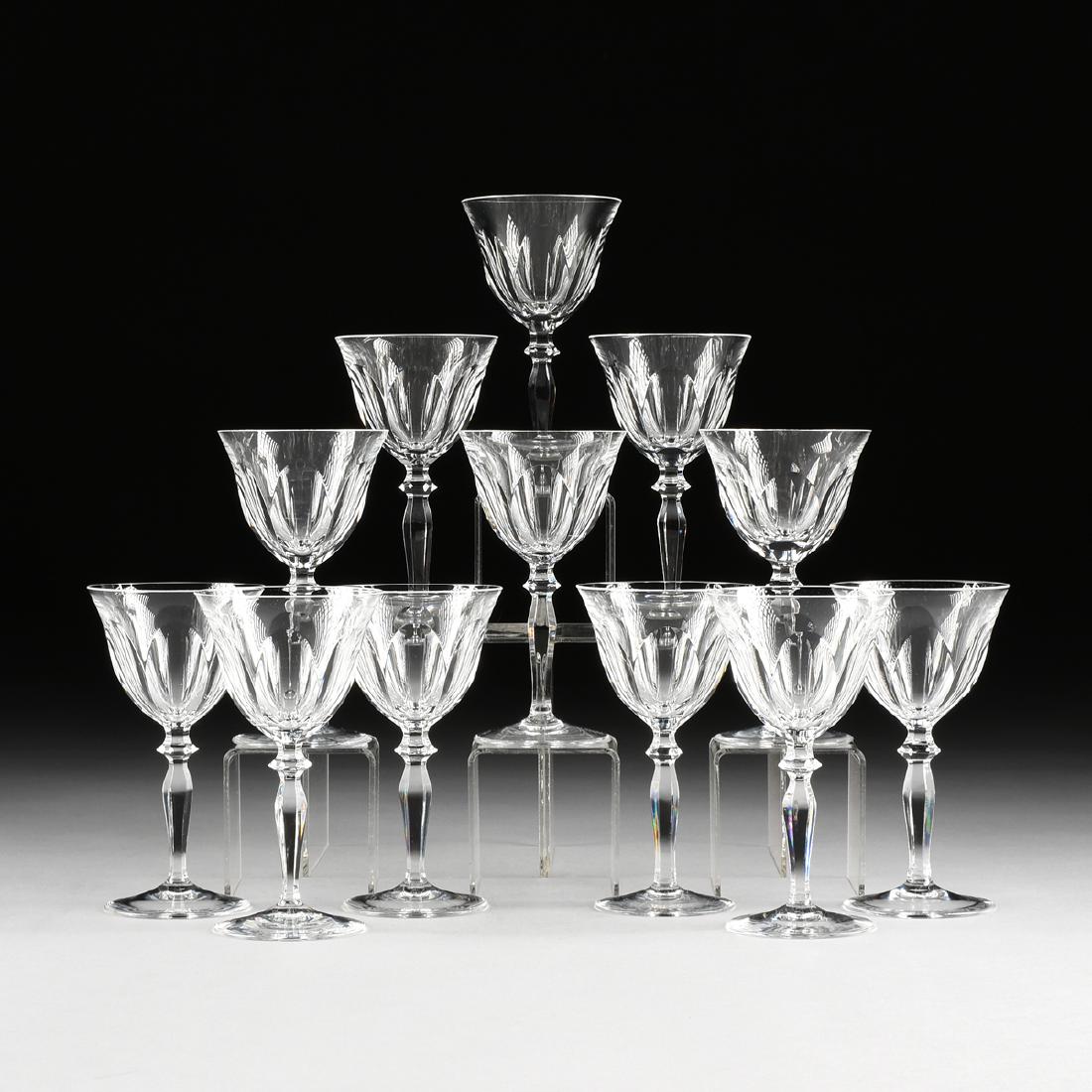 A SET OF TWELVE PEILL & PUTZLER CUT CRYSTAL WHITE WINE: A SET OF TWELVE PEILL & PUTZLER CUT CRYSTAL WHITE WINE GLASSES IN THE "RHEINLAND" PATTERN, DUREN, GERMANY, CIRCA 1960, the bell form bowls with a band of slice cuts at the base leading to faceted knop