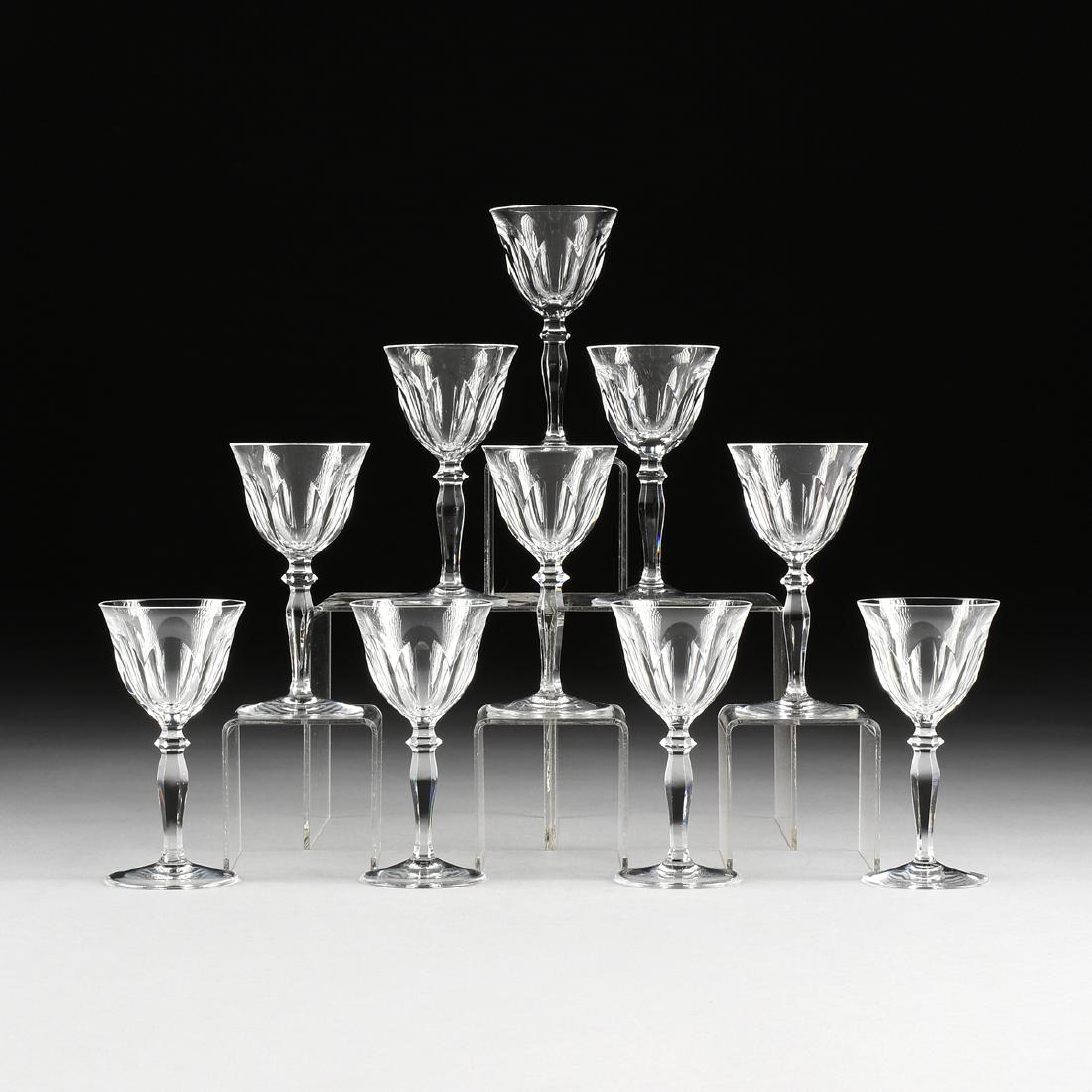 A SET OF TEN PEILL & PUTZLER CUT CRYSTAL WINE GLASSES: A SET OF TEN PEILL & PUTZLER CUT CRYSTAL WINE GLASSES IN THE "RHEINLAND" PATTERN, DUREN, GERMANY, CIRCA 1960, the bell form bowls with a band of slice cuts at the base leading to faceted knop over bal