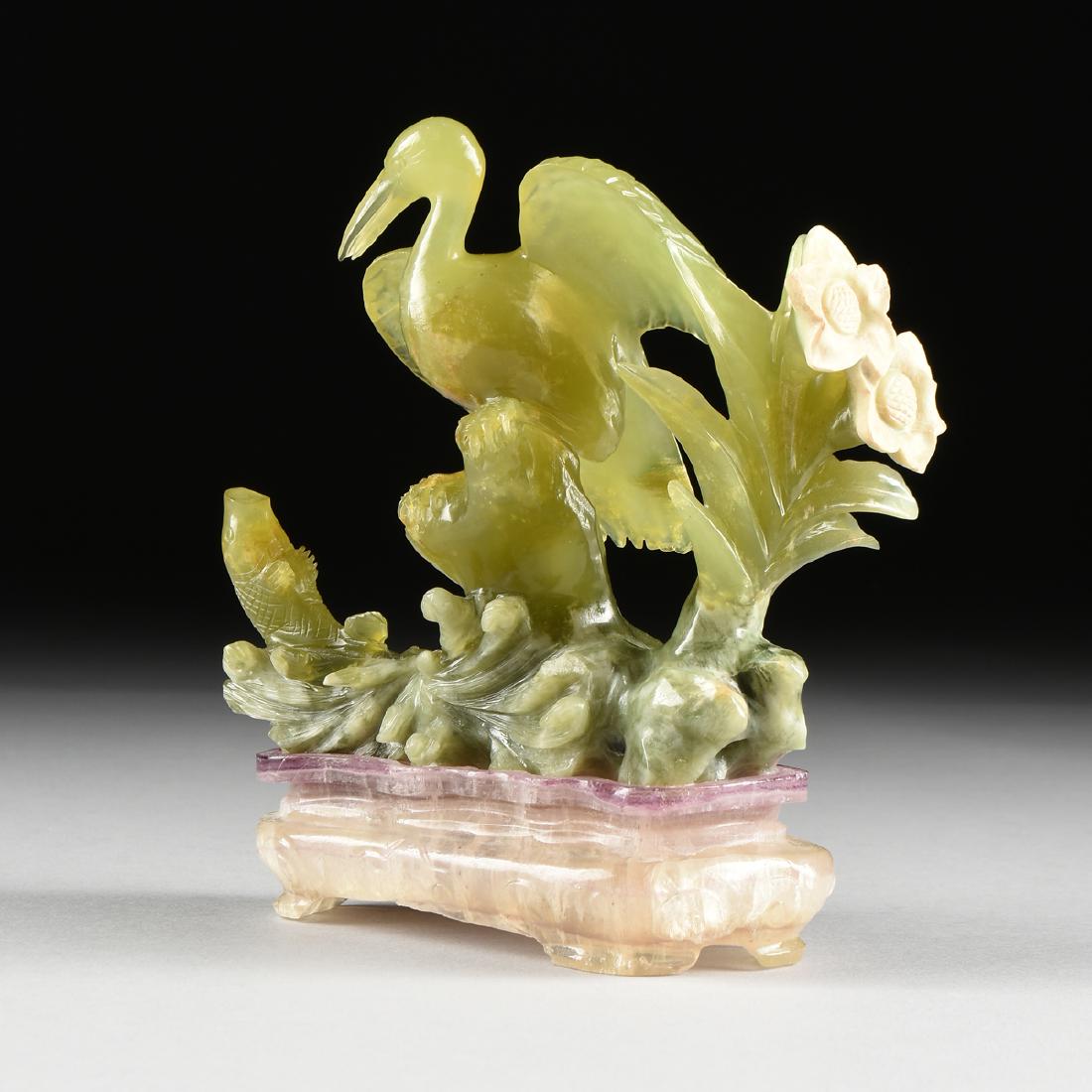 A CHINESE EXPORT CARVED JADE FIGURE OF A BIRD AND FISH (1 of 9)