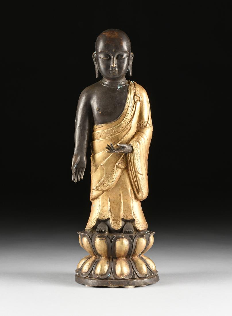 A JAPANESE STYLE PATINATED GILT BRONZE STATUE OF (1 of 11)