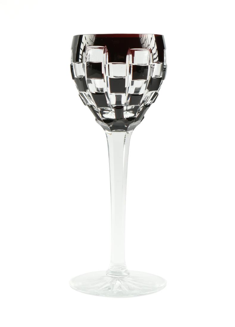 EMANUEL JOSEF MARGOLD (Austrian/Slovak 1888-1962) A: EMANUEL JOSEF MARGOLD (Austrian/Slovak 1888-1962) A SECESSIONIST RUBY FLASHED WINE GLASS, FOR CARL SCHAPPEL, HAIDA, BOHEMIA, CIRCA 1910, the bowl with intersecting bevel cut tapering rectangles altern