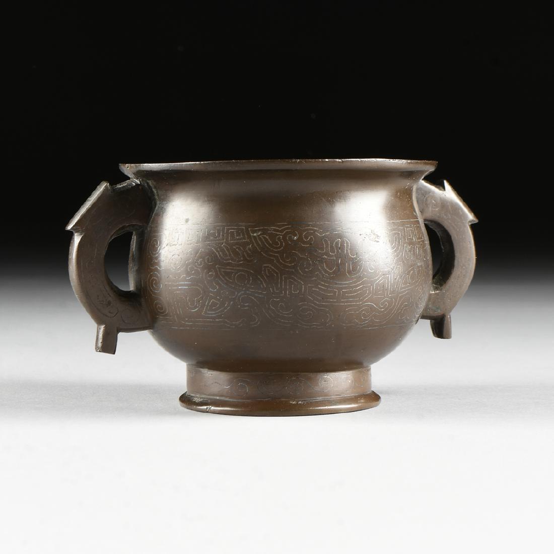 A MING DYNASTY STYLE BRONZE AND SILVER INLAID GUI (1 of 7)