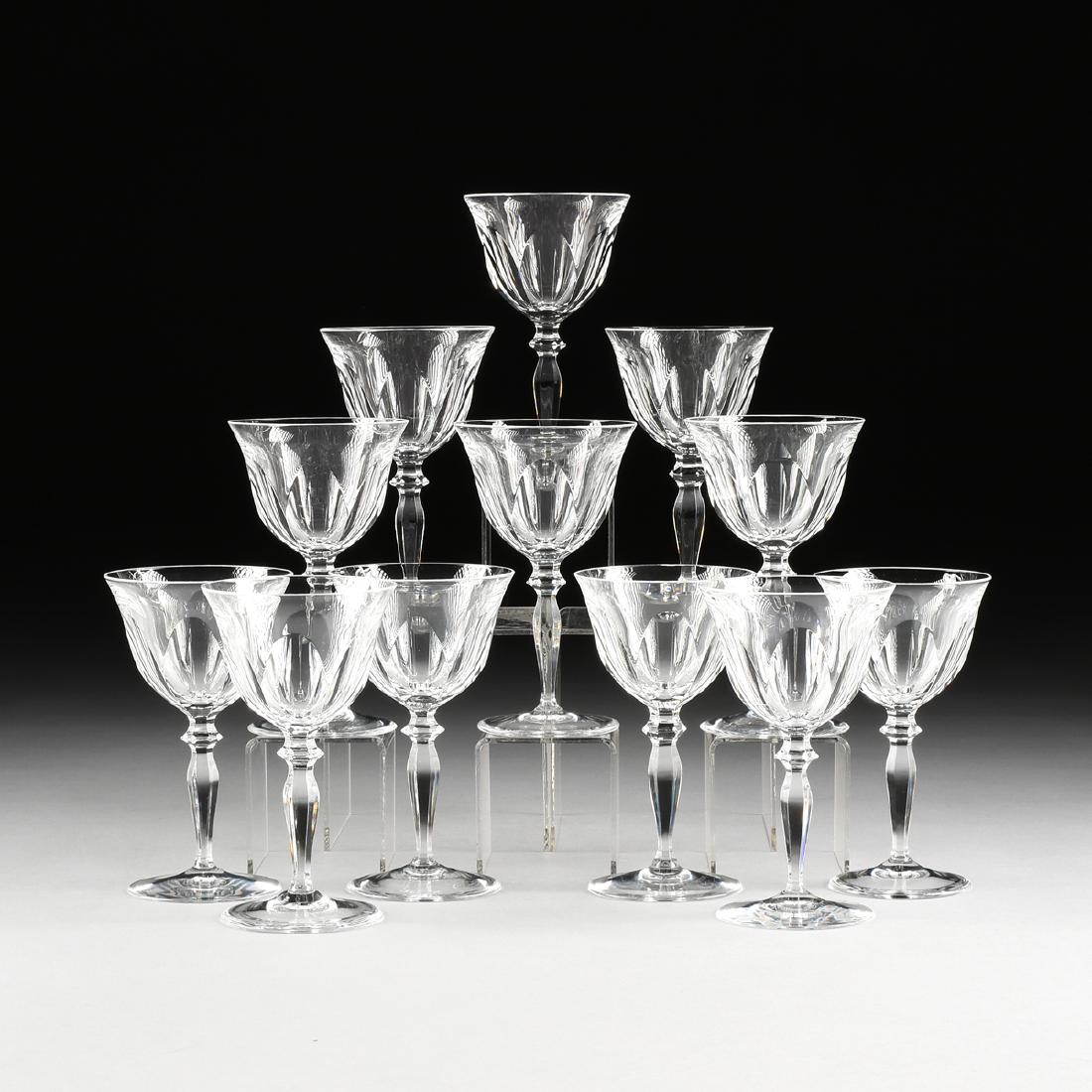 A SET OF TWELVE PEILL & PUTZLER CUT CRYSTAL RHINE WINE: A SET OF TWELVE PEILL & PUTZLER CUT CRYSTAL RHINE WINE GLASSES IN THE "RHEINLAND" PATTERN, DUREN, GERMANY, CIRCA 1960, the bell form bowls with a band of slice cuts at the base leading to faceted knop