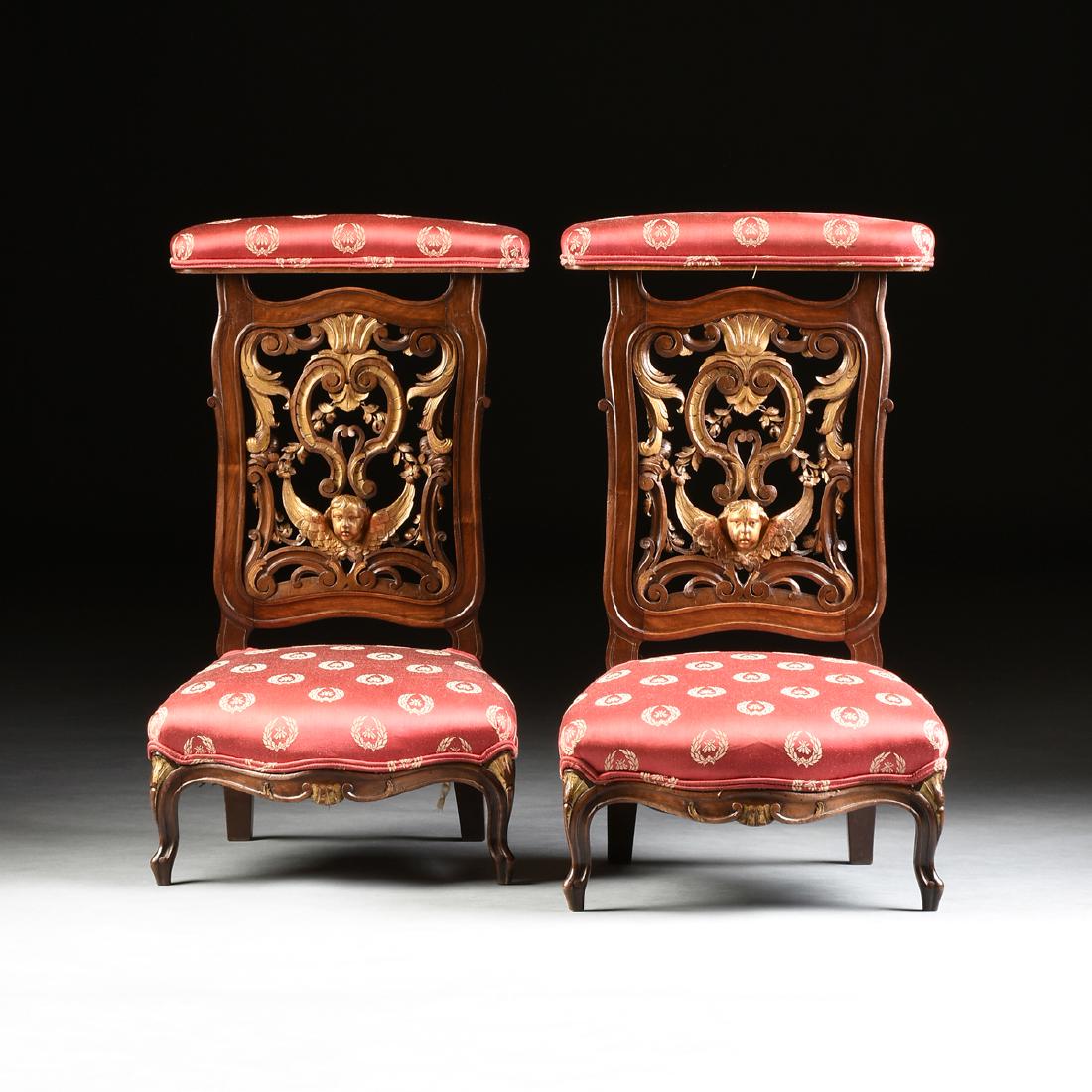 A PAIR OF RENAISSANCE REVIVAL PARCEL GILT WALNUT PRIE: A PAIR OF RENAISSANCE REVIVAL PARCEL GILT WALNUT PRIE DIEUX,FRENCH, LAST QUARTER 19TH CENTURY, each curved, upholstered armrest over a pierced scrolled foliate back with a relief angel mask, above a b
