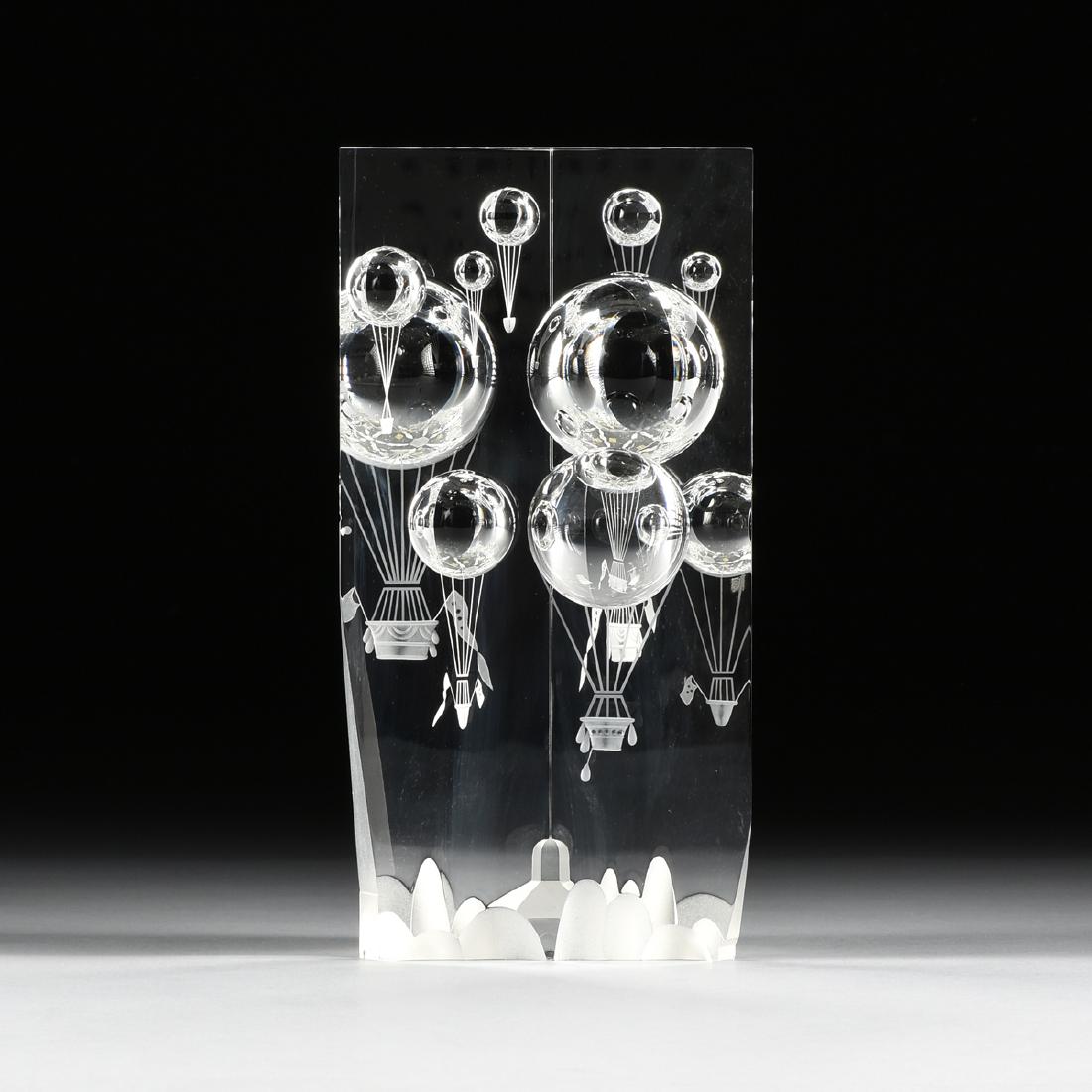 BERNARD X. WOLFF (AMERICAN b. CIRCA 1930) A CUT AND: BERNARD X. WOLFF (AMERICAN b. CIRCA 1930) A CUT AND ENGRAVED CLEAR CRYSTAL SCULPTURE "BALLOON RALLY," FOR STEUBEN, CORNING, NEW YORK, DESIGNED 1985, the triangular prism cut with six intaglio hemisphe