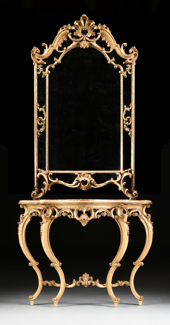 A ROCOCO REVIVAL BOMBÉ POLYCHROME GILTWOOD AND GESSO: A ROCOCO REVIVAL BOMBÉ POLYCHROME GILTWOOD AND GESSO PIER MIRROR AND TABLE, MID 20TH CENTURY, the central pierced acanthus leaf fan, above an arched mirror with colored flower tendrils, surmounting a