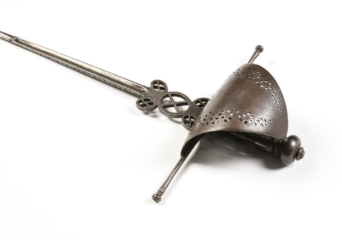 A SPANISH/PORTUGUESE LEFT HANDED SAIL HILT DAGGER,: A SPANISH/PORTUGUESE LEFT HANDED SAIL HILT DAGGER, 18TH/19TH CENTURY, the double edged blade with sides centering fullers, within "X" and line incisions,ending before a tapering ridged point, within "