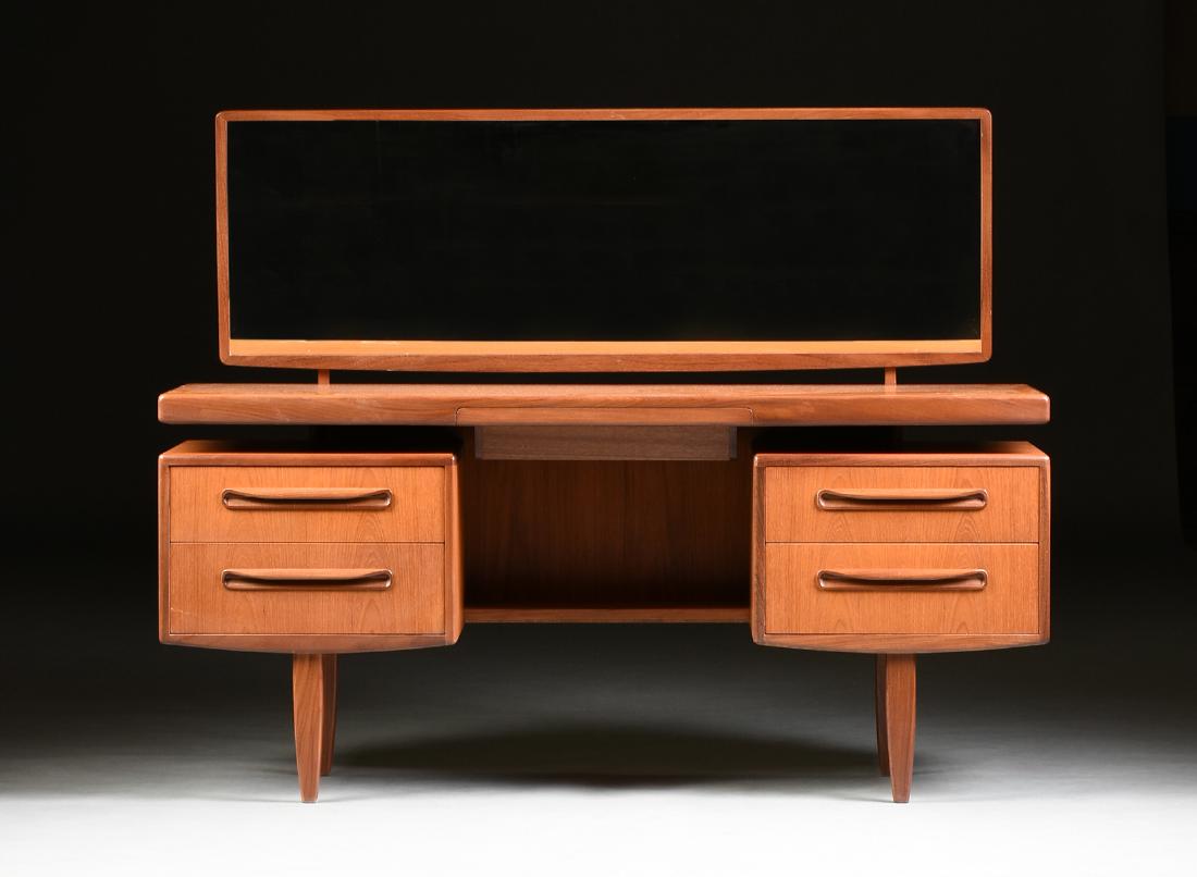 VICTOR BRAMWELL WILKINS (British, 20th Century) A: VICTOR BRAMWELL WILKINS (British, 20th Century) A G-PLAN TEAK DRESSING TABLE WITH MIRROR FROM THE "Fresco" LINE, FOR E. GROMME LTD., HIGH WYCOMBE, ENGLAND, DESIGNED 1967, the dressing table with teak 