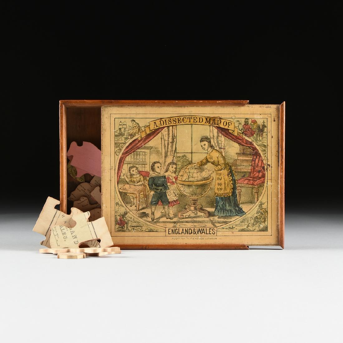 A BOXED PEACOCK & CO. TOY JIGSAW PUZZLE, "A DISSECTED: A BOXED PEACOCK & CO. TOY JIGSAW PUZZLE, "A DISSECTED MAP OF ENGLAND & WALES," GALL & INGLIS MAP, CIRCA 1875, in original box, retaining all puzzle pieces. Height: 2" Width: 9 1/8" Depth: 7 1/4"