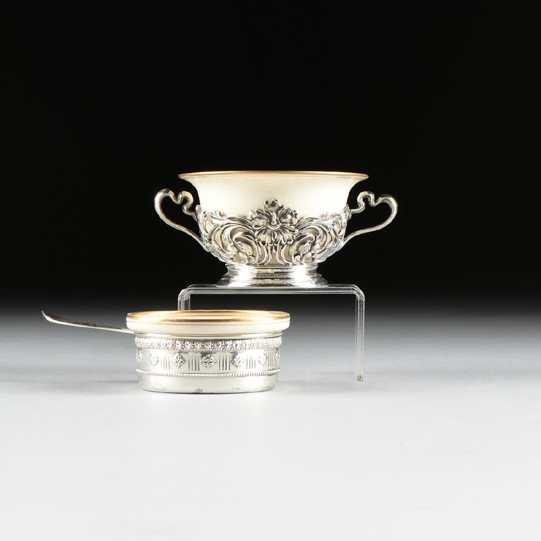 A GROUP OF NINETEEN GILT RIMMED LENOX PORCELAIN BOWLS: A GROUP OF NINETEEN GILT RIMMED LENOX PORCELAIN BOWLS WITH STERLING SILVER HOLDERS, CIRCA 1900-1910, comprising a set of twelve individual cream colored souffle ramekins with Mauser Mfg. Company sterl
