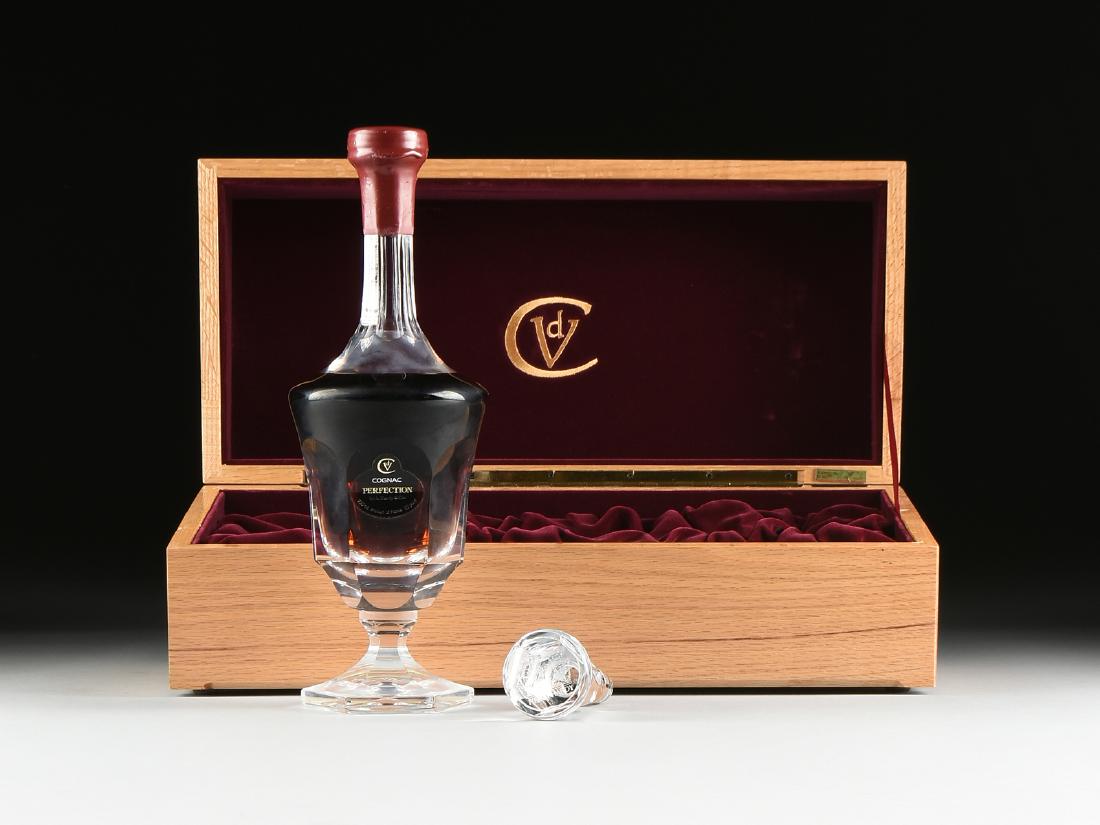 A BOTTLE OF HARDY PERFECTION COGNAC,: A BOTTLE OF HARDY PERFECTION COGNAC, a single bottle of fine cognac by A. Hardy & Cie. In a custom made Daum Nancy carafe and with fitted and hinged oak box. Glass stopper included in presentation. Wa