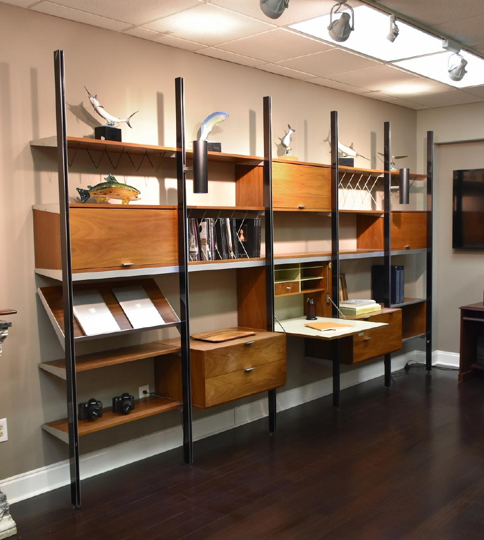 A GEORGE NELSON (American, 1908-1986) ALUMINUM, WALNUT,: A GEORGE NELSON (American, 1908-1986) ALUMINUM, WALNUT, STEEL, AND LAMINATE "CSS" FIVE BAY WALL UNIT, FOR HERMAN MILLER, ZEELAND, MICHIGAN, DESIGNED 1957, the Comprehensive Storage System comprising s