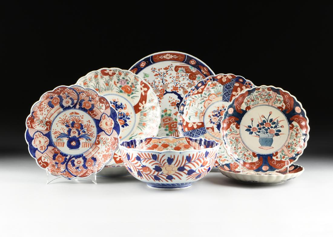A GROUP OF EIGHT IMARI ENAMELED PORCELAIN PLATES, BOWL,: A GROUP OF EIGHT IMARI ENAMELED PORCELAIN PLATES, BOWL, AND CHARGER, JAPANESE EXPORT, LATE MEIJI PERIOD (1868-1912) AND AFTER, comprising six floriform plates with various flowering pot and vegetal mo
