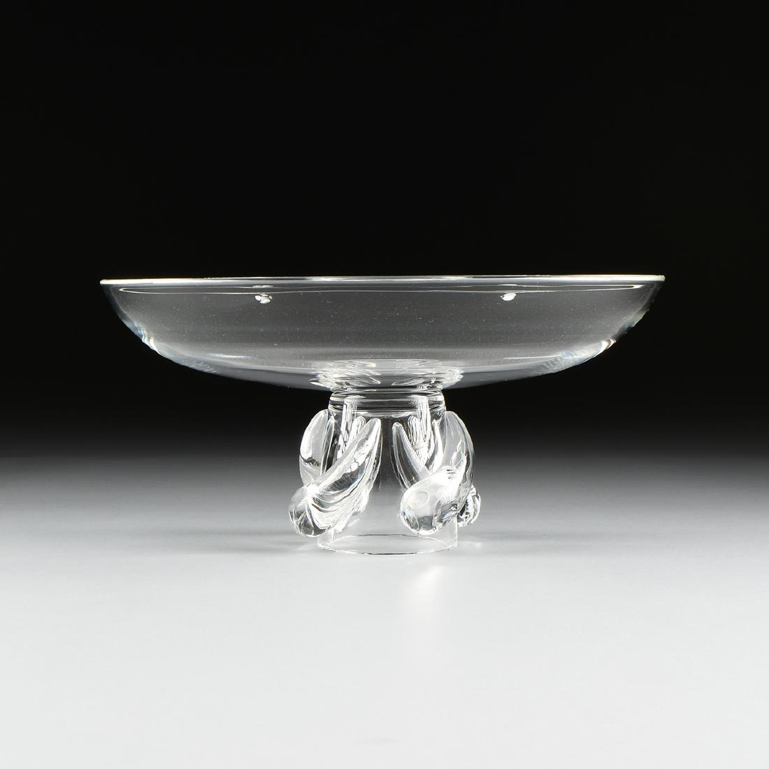 GEORGE THOMPSON (AMERICAN 20th CENTURY) A CLEAR CRYSTAL: GEORGE THOMPSON (AMERICAN 20th CENTURY) A CLEAR CRYSTAL CENTERPIECE IN THE "SWIRL BOWL" PATTERN, MODEL 8037, FOR STEUBEN GLASSWORKS, CORNING, NEW YORK, DESIGNED 1952, low profile and raised on spreadi